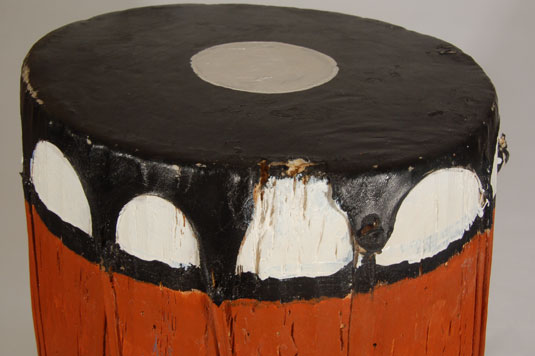 Condition: a slight tear exists at the edge of the top leather drum head but does not affect the sound of the drum.