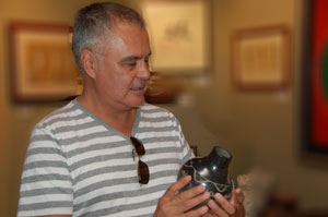 Russell Sanchez (the artist) holding this jar.  Russell is from San Ildefonso Pueblo.