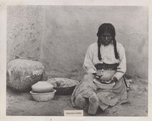 This potter was staged by an unknown photographer at an unknown date. The potter is identified as Tewingyinema. We are appreciative to Hopi-Tewa potter, Mark Tahbo, for sharing this photograph with us. The photograph was recently found in a burned out home at First Mesa. This potter was staged by an unknown photographer at an unknown date. The potter is identified as Tewingyinema. We are appreciative to Hopi-Tewa potter, Mark Tahbo, for sharing this photograph with us. The photograph was recently found in a burned out home at First Mesa.